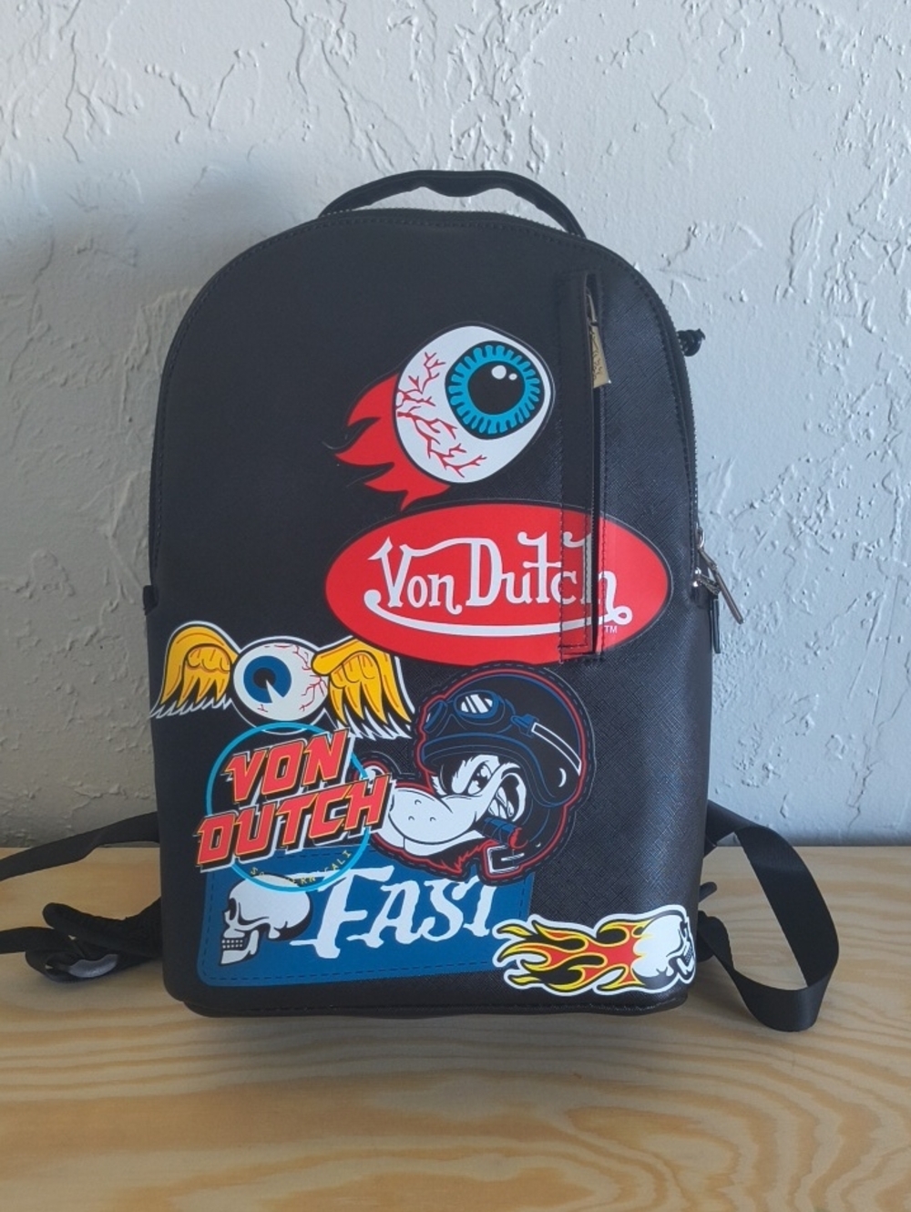 Von Dutch Black Backpack with Multi-Color Graphic Patches